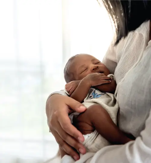 Woman holding child